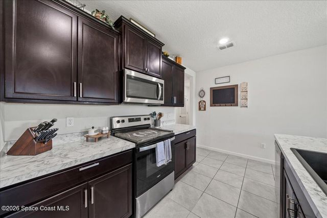3250 Burrowing Owl Drive, Mims, FL 32754