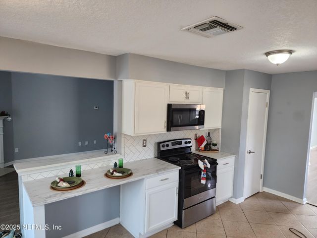 6971 HUNTINGTON WOODS Circle W, Jacksonville, FL 32244