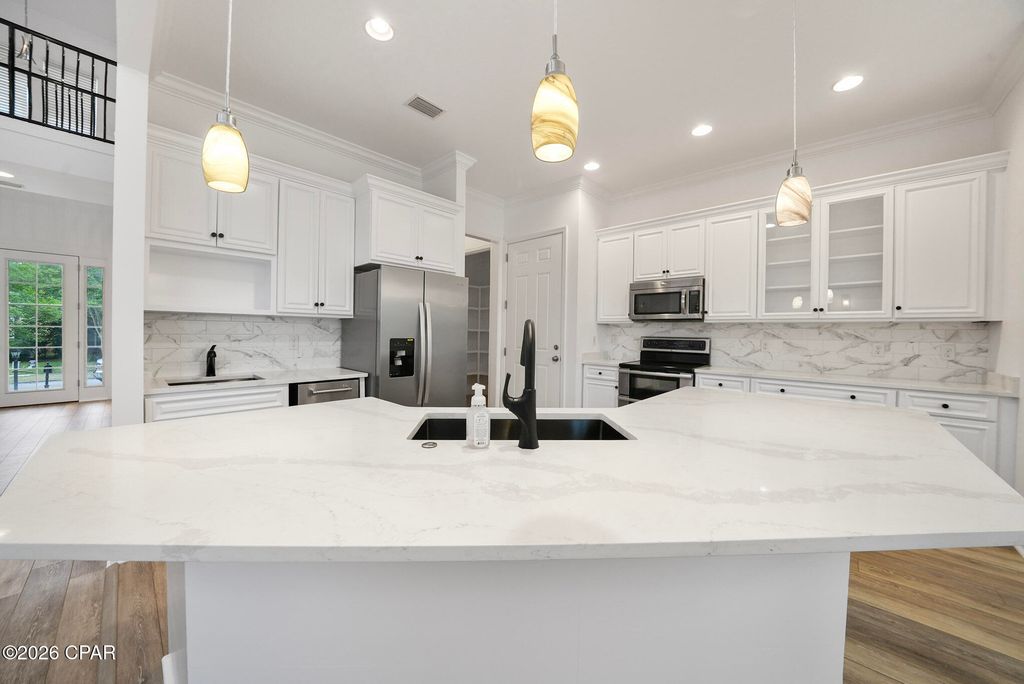 Image 21 of property listing at 300 Coconut Grove Court, Panama City Beach, FL 32407