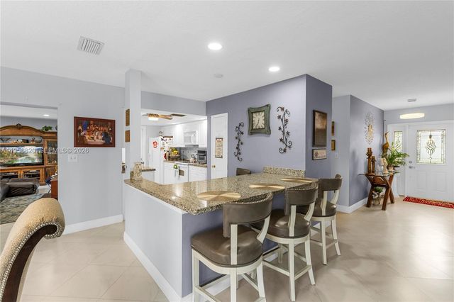 7185 E Tropical Way, Plantation, FL 33317