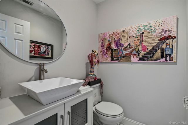 84 Woodlake Drive W, Woodbury, NY 11797