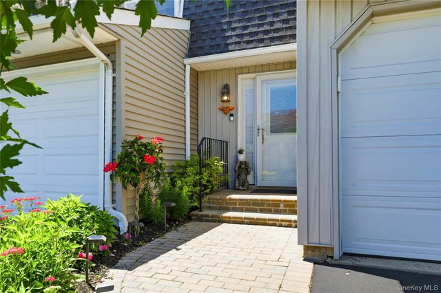 84 Woodlake Drive W, Woodbury, NY 11797