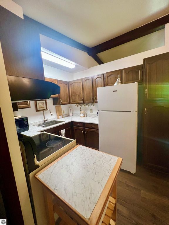 Image 11 of property listing at 429 S Geneva Road, Shepherd, MI 48883