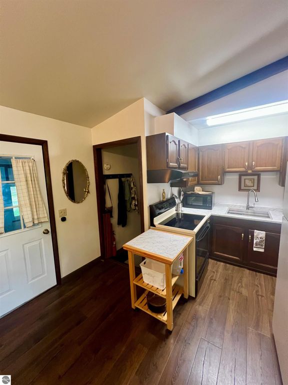Image 12 of property listing at 429 S Geneva Road, Shepherd, MI 48883
