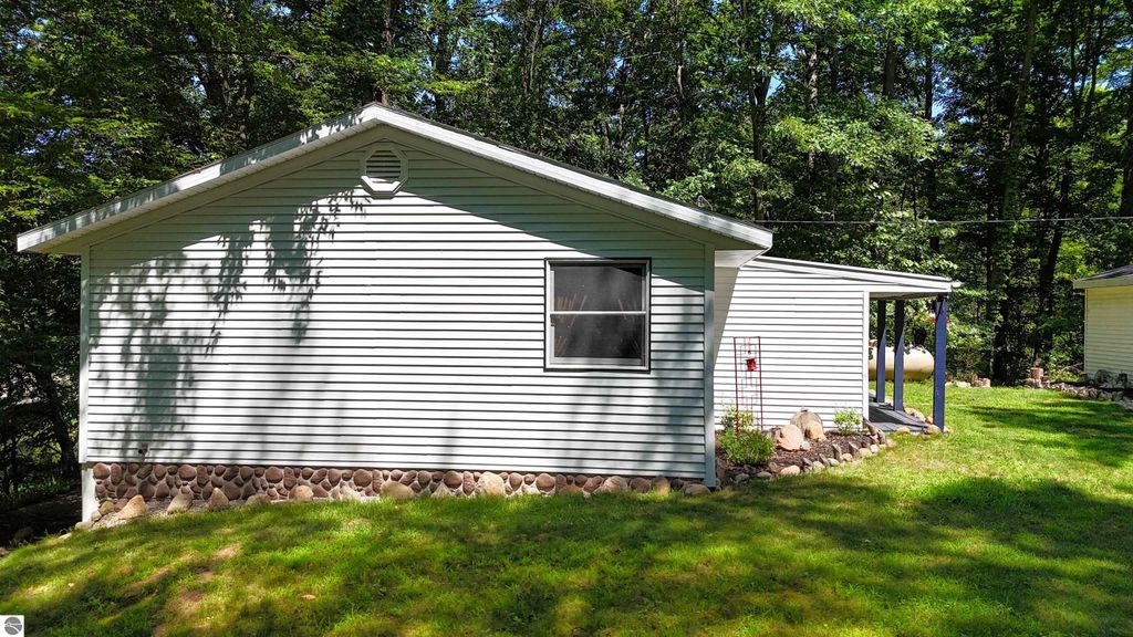Image 30 of property listing at 429 S Geneva Road, Shepherd, MI 48883