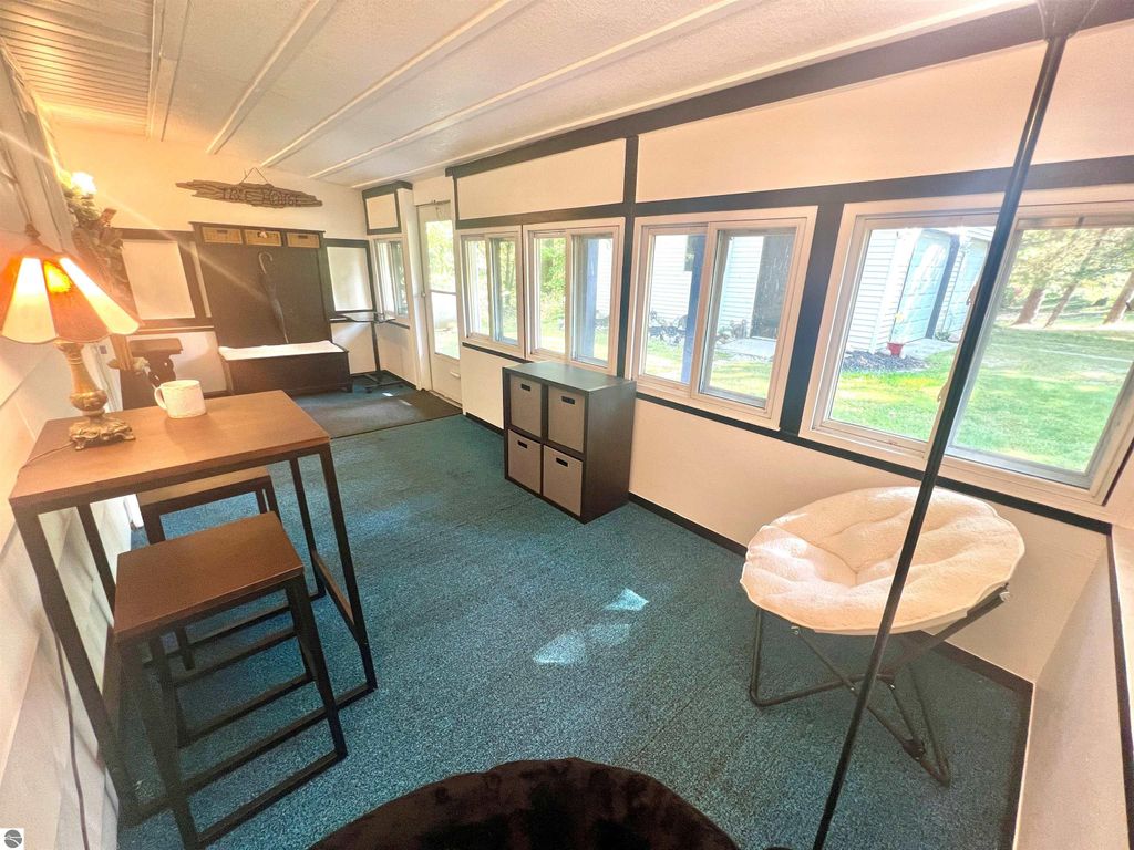 Image 4 of property listing at 429 S Geneva Road, Shepherd, MI 48883