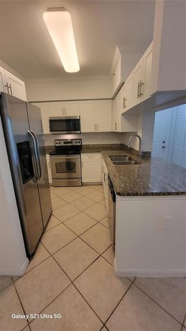 6533 Emerald Dunes Drive 205, West Palm Beach, FL 33411