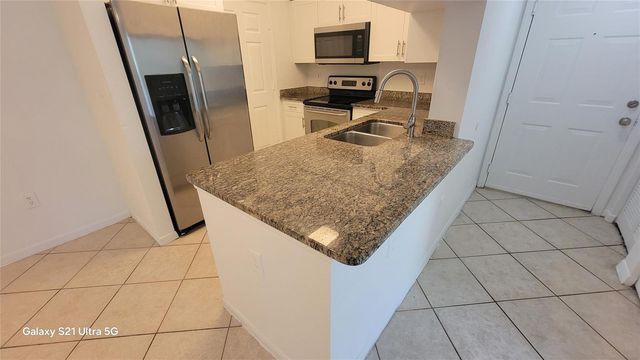 6533 Emerald Dunes Drive 205, West Palm Beach, FL 33411