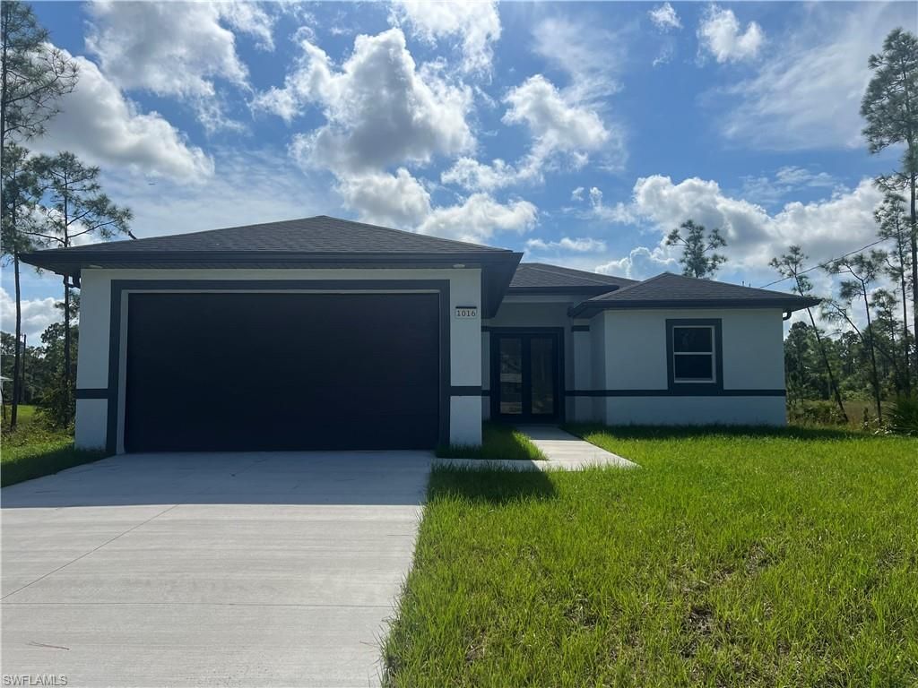 1016 Grant BLVD, LEHIGH ACRES, FL 33974 — exterior
