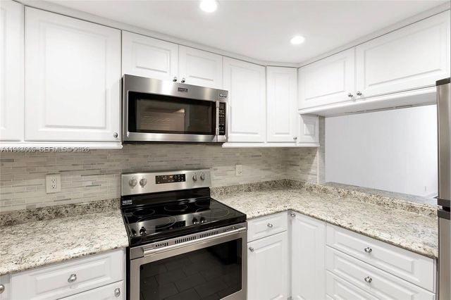 9430 Live Oak Pl 407, Davie, FL 33324