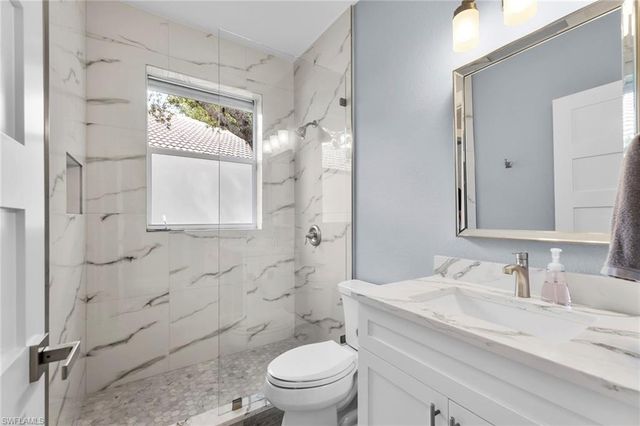 1511 Whispering Oaks CIR, Naples, FL 34110
