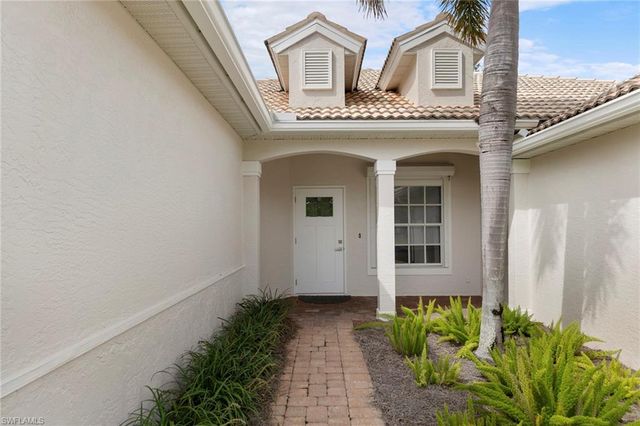 1511 Whispering Oaks CIR, Naples, FL 34110