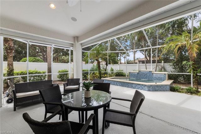 1511 Whispering Oaks CIR, Naples, FL 34110