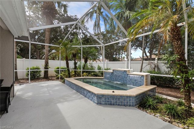 1511 Whispering Oaks CIR, Naples, FL 34110