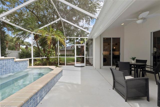 1511 Whispering Oaks CIR, Naples, FL 34110