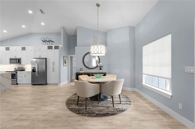 1511 Whispering Oaks CIR, Naples, FL 34110
