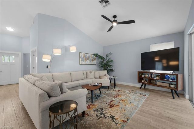 1511 Whispering Oaks CIR, Naples, FL 34110