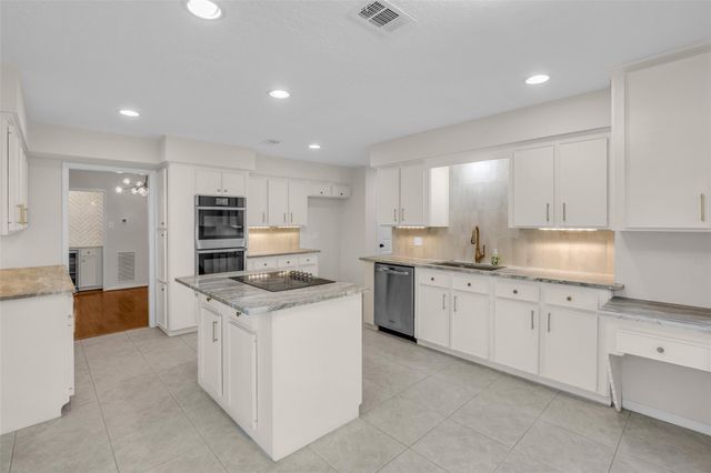 11407 Timberwild Street, The Woodlands, TX 77380