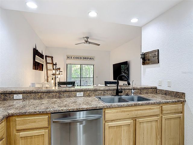 9055 TREASURE TROVE LANE 207, Kissimmee, FL 34747