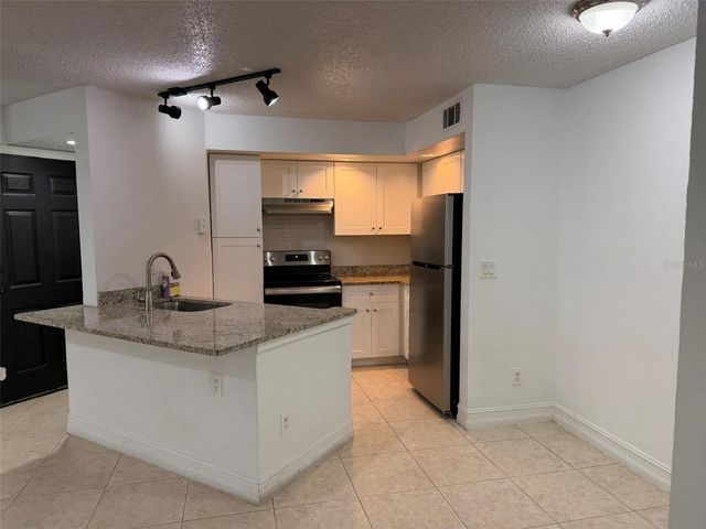 4658 COMMANDER DRIVE 813, Orlando, FL 32822
