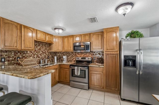 9406 W FLORA STREET, Tampa, FL 33615