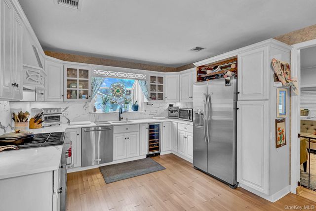 27 McGaw Avenue, Lake Grove, NY 11755