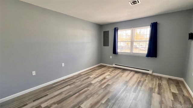 421 Weymouth Court D, Ridge, NY 11961