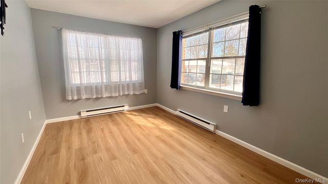 421 Weymouth Court D, Ridge, NY 11961