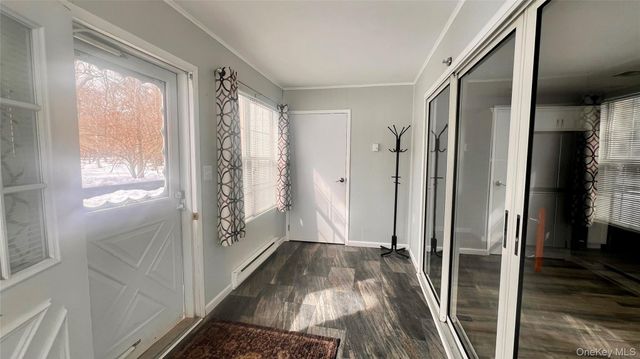 421 Weymouth Court D, Ridge, NY 11961