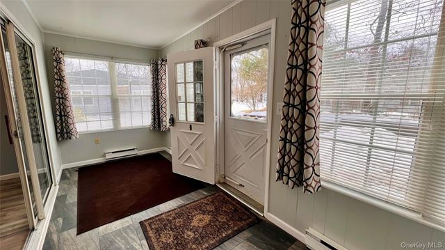 421 Weymouth Court D, Ridge, NY 11961