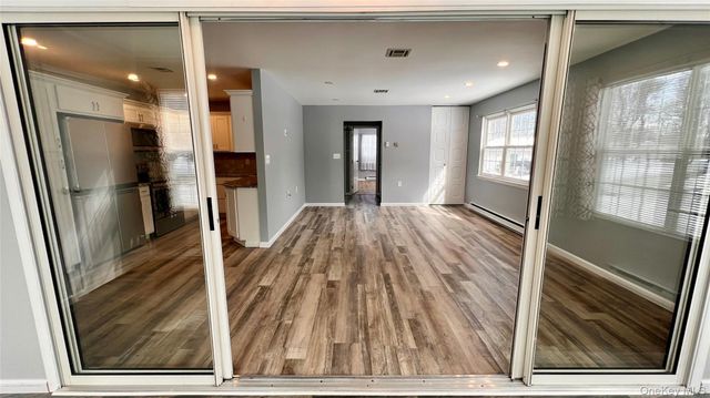 421 Weymouth Court D, Ridge, NY 11961