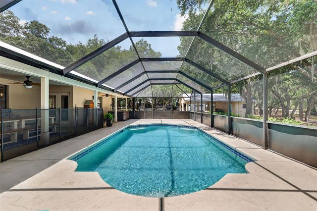 11241 EM EN EL GROVE ROAD, Leesburg, FL 34788