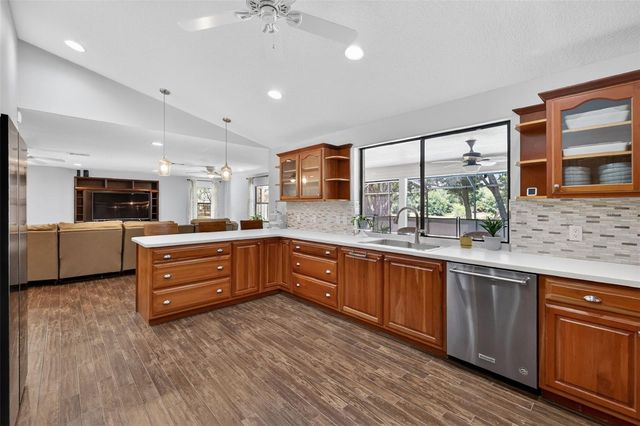 11241 EM EN EL GROVE ROAD, Leesburg, FL 34788