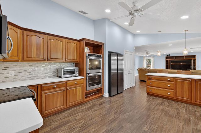 11241 EM EN EL GROVE ROAD, Leesburg, FL 34788