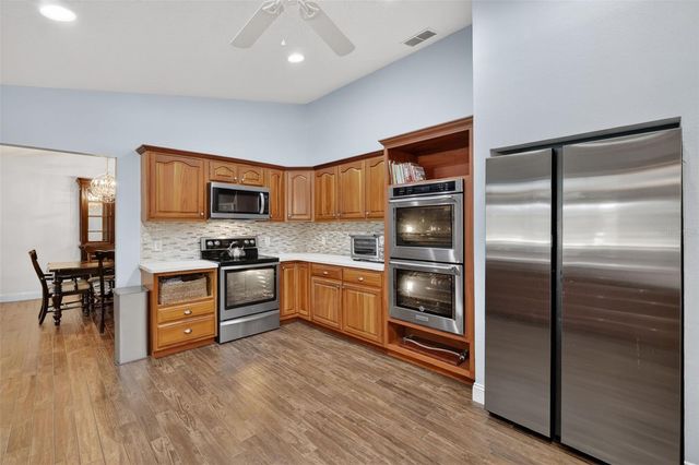 11241 EM EN EL GROVE ROAD, Leesburg, FL 34788