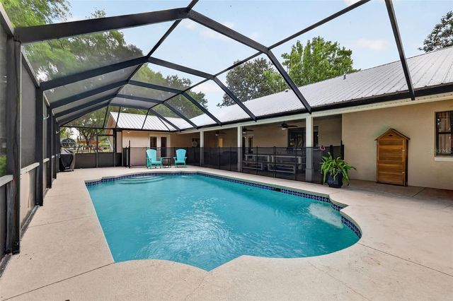 11241 EM EN EL GROVE ROAD, Leesburg, FL 34788