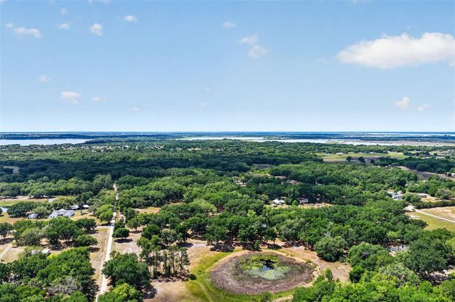 11241 EM EN EL GROVE ROAD, Leesburg, FL 34788