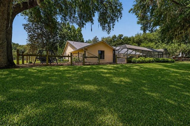 11241 EM EN EL GROVE ROAD, Leesburg, FL 34788