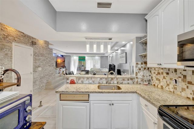 12662 NW 14TH STREET, Sunrise, FL 33323