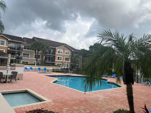 8821 Wiles Rd 102, Coral Springs, FL 33067