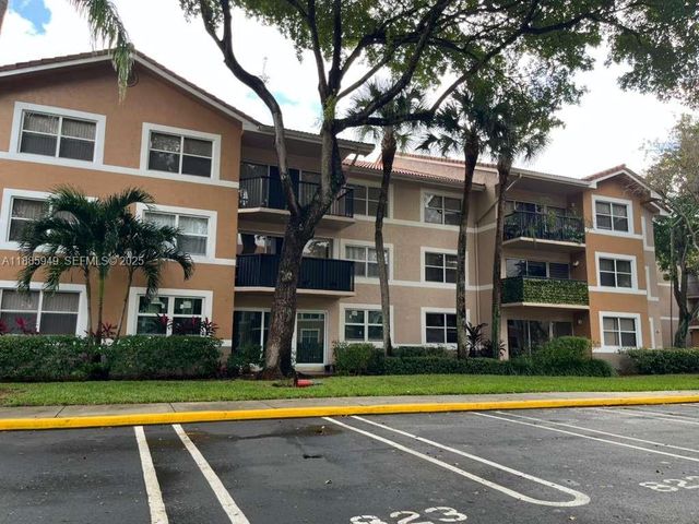 8821 Wiles Rd 102, Coral Springs, FL 33067