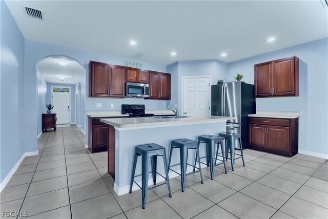 10357 Silver Pond LN, Lehigh Acres, FL 33936