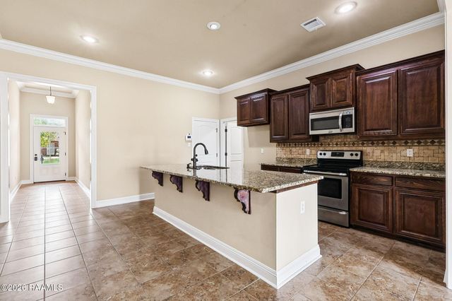 210 Woodhaven Road, Youngsville, LA 70592