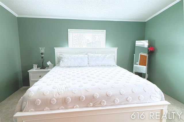 7358 Willow Wood Drive, Belmont, MI 49306