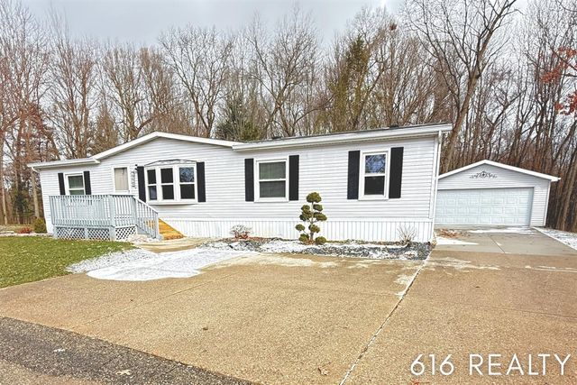 7358 Willow Wood Drive, Belmont, MI 49306