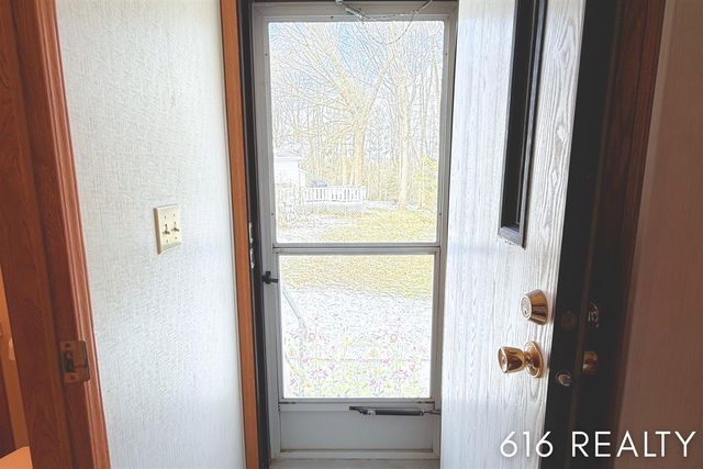 7358 Willow Wood Drive, Belmont, MI 49306