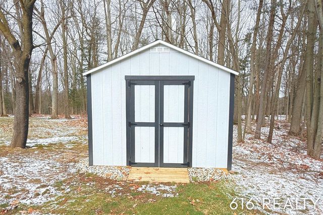 7358 Willow Wood Drive, Belmont, MI 49306