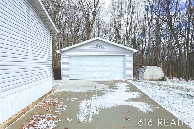 7358 Willow Wood Drive, Belmont, MI 49306
