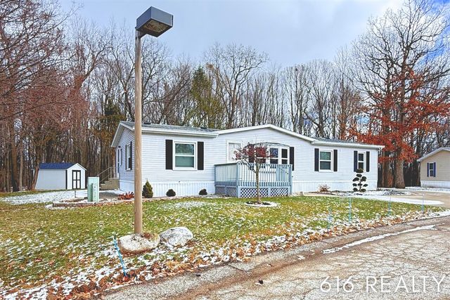 7358 Willow Wood Drive, Belmont, MI 49306