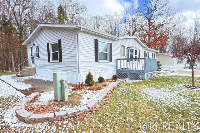 7358 Willow Wood Drive, Belmont, MI 49306